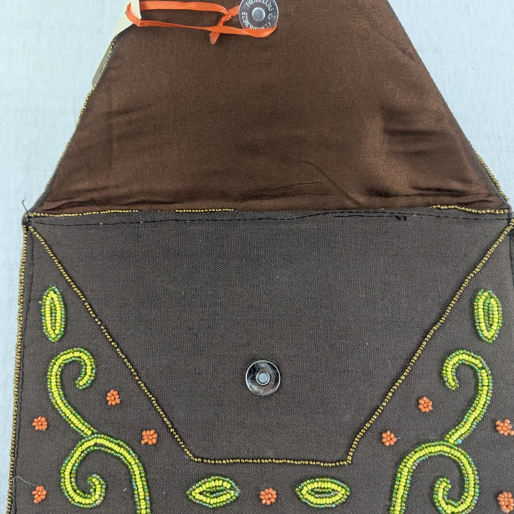 Vibrant Beaded Clutch with Embroidered Swirls